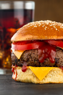 Hamburger on black  and soda